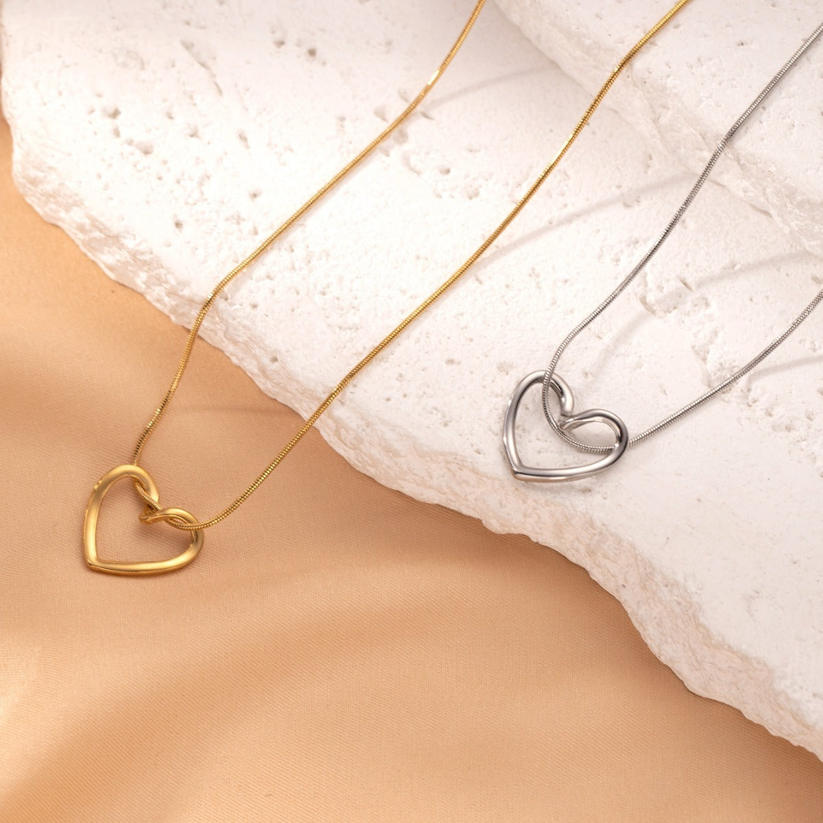 Stainless Steel Twist Hollow Heart Pendant Necklace